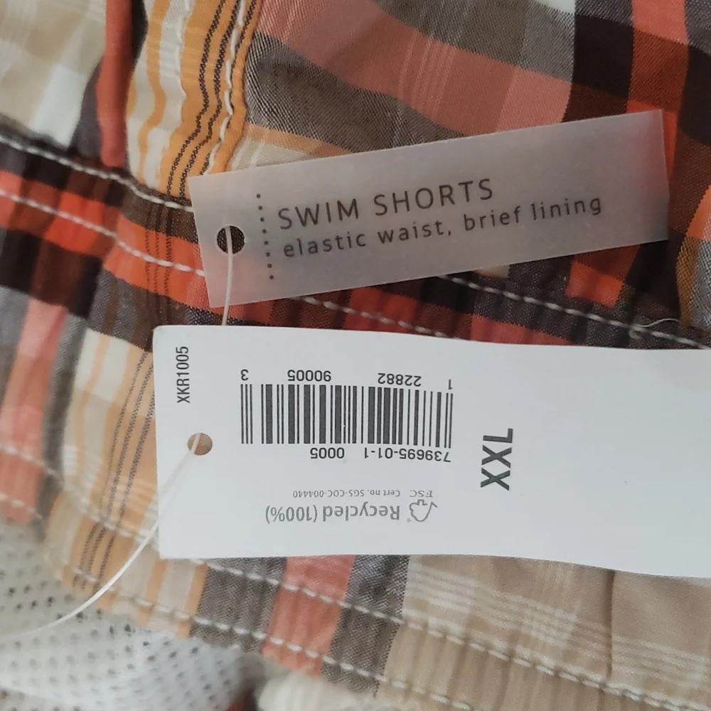 Old Navy plaid swim shorts tan, orange, brown. Pockets, built in brief. Size XXL
